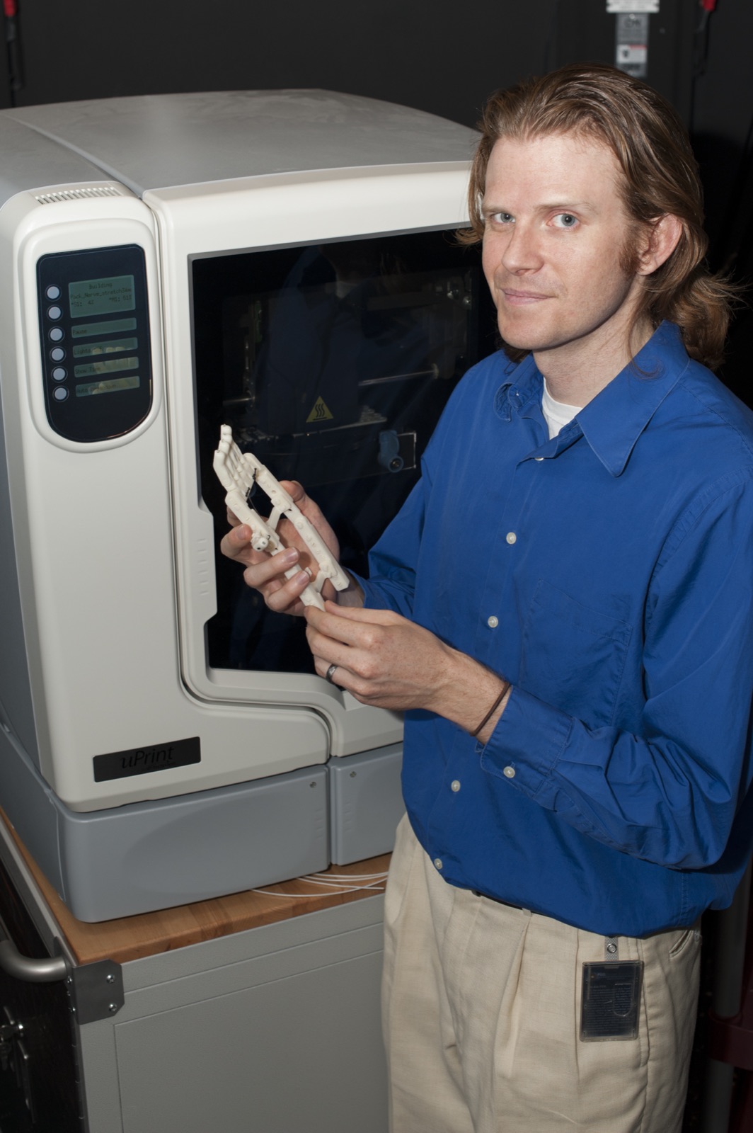 A 3D printer running in a lab setting.